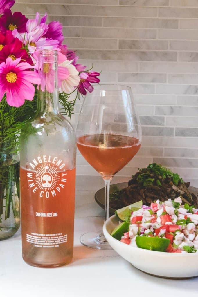 Angeleno wine company rose with 2 bowls of food and pink flowers