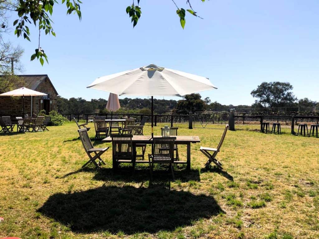 outdoor table and chairs at De Beaurepaire winery