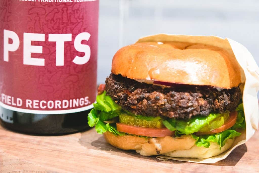 Field Recordings PETS wine with a veggie burger