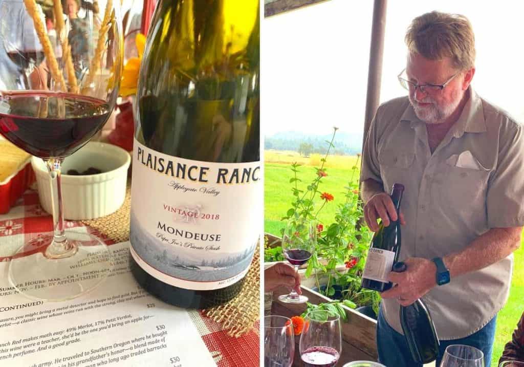 Plaisance Ranch owner holding a bottle of Mondeuse wine