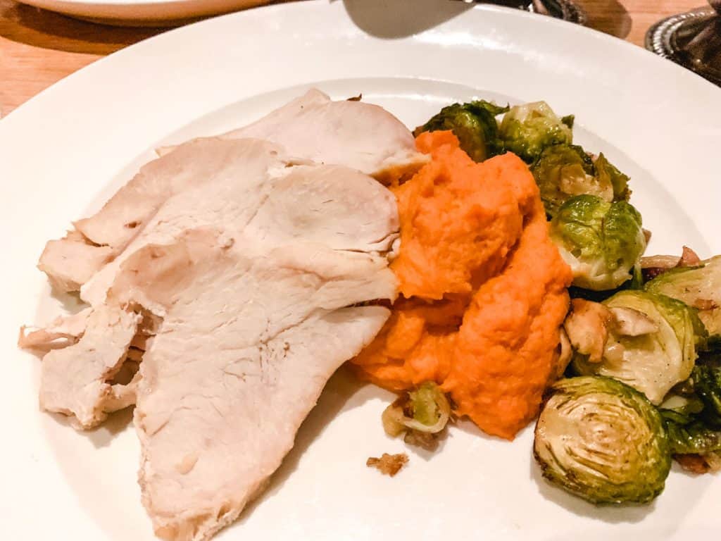 Turkey dinner with mashed yams and brussel sprouts