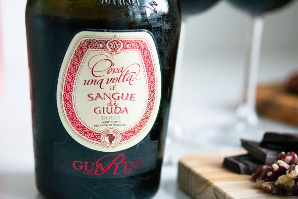 Label for Sangue di Giuda Dolce wine from Guarini
