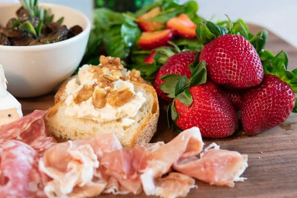 prosciutto, strawberries, and cheese platter
