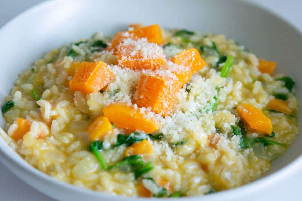 bowl of butternut squash risotto with spinach