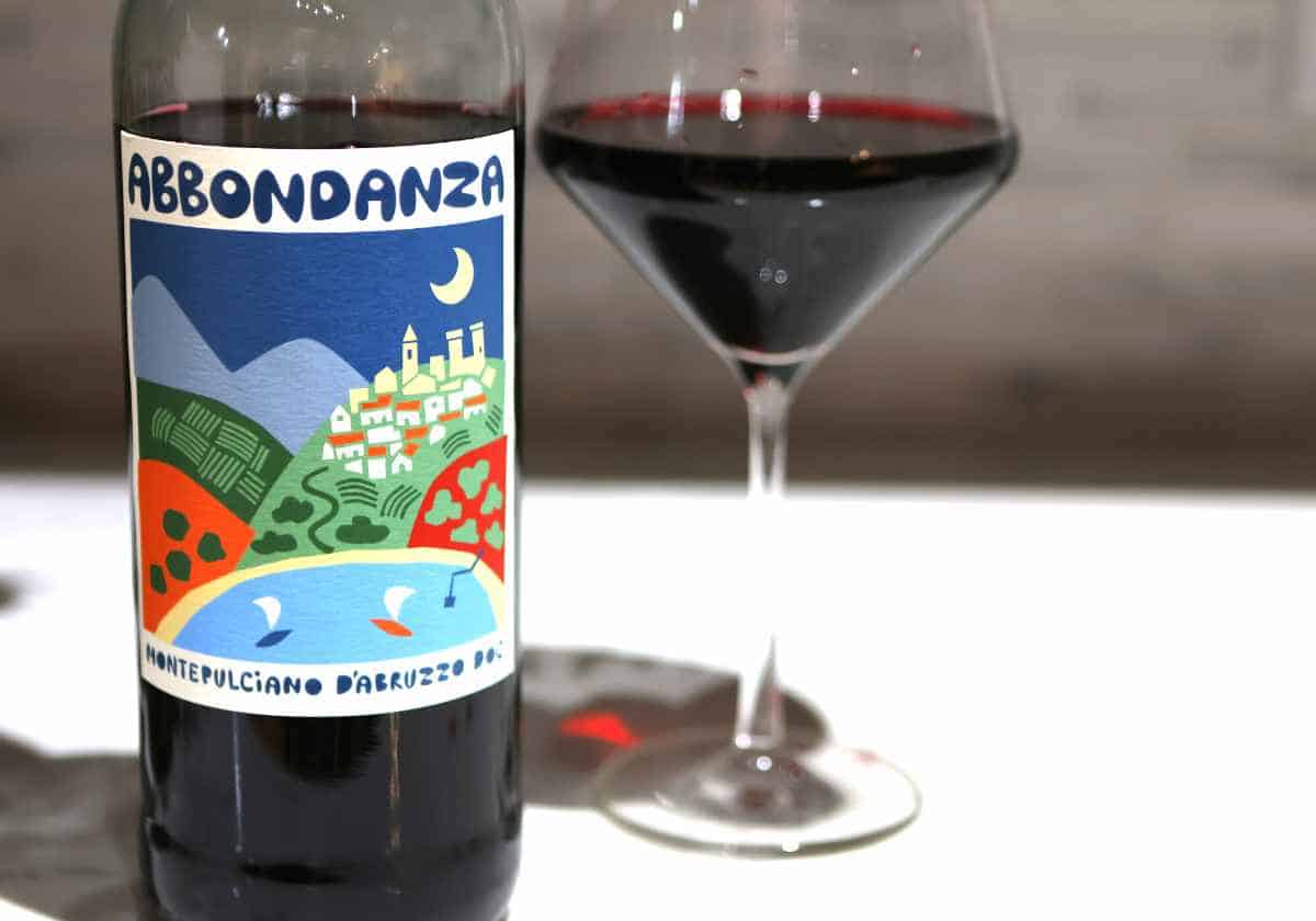 Abbondanza Montelpuciano d'Abruzzo wine bottle and glass